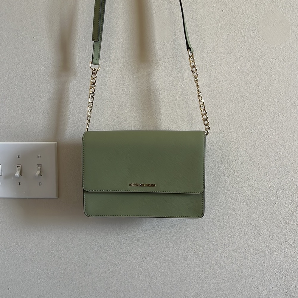 Sage green Michael Kors cross-body bag.